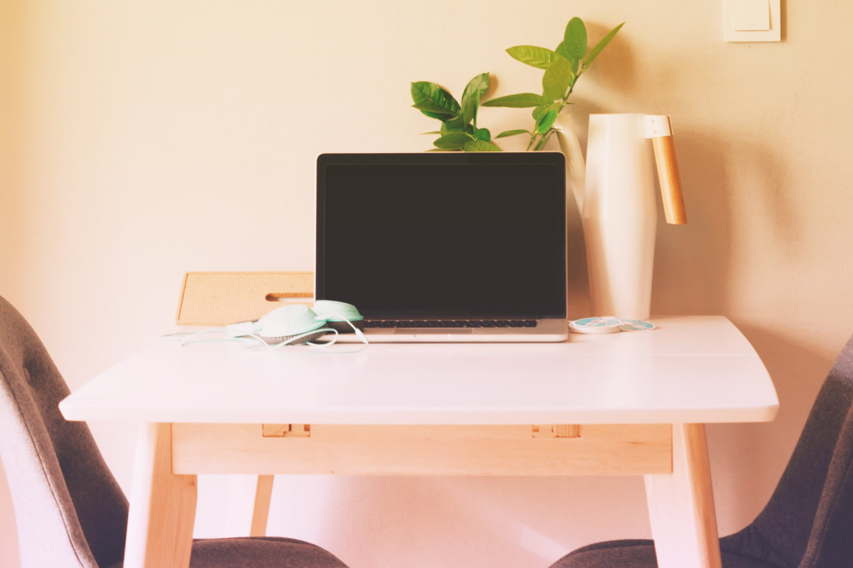 Laptop on a simple workspace desk